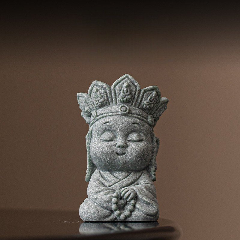 Cute "Focus" monk statue holding meditation beads