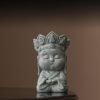 Cute "Zen" monk statue in meditation pose