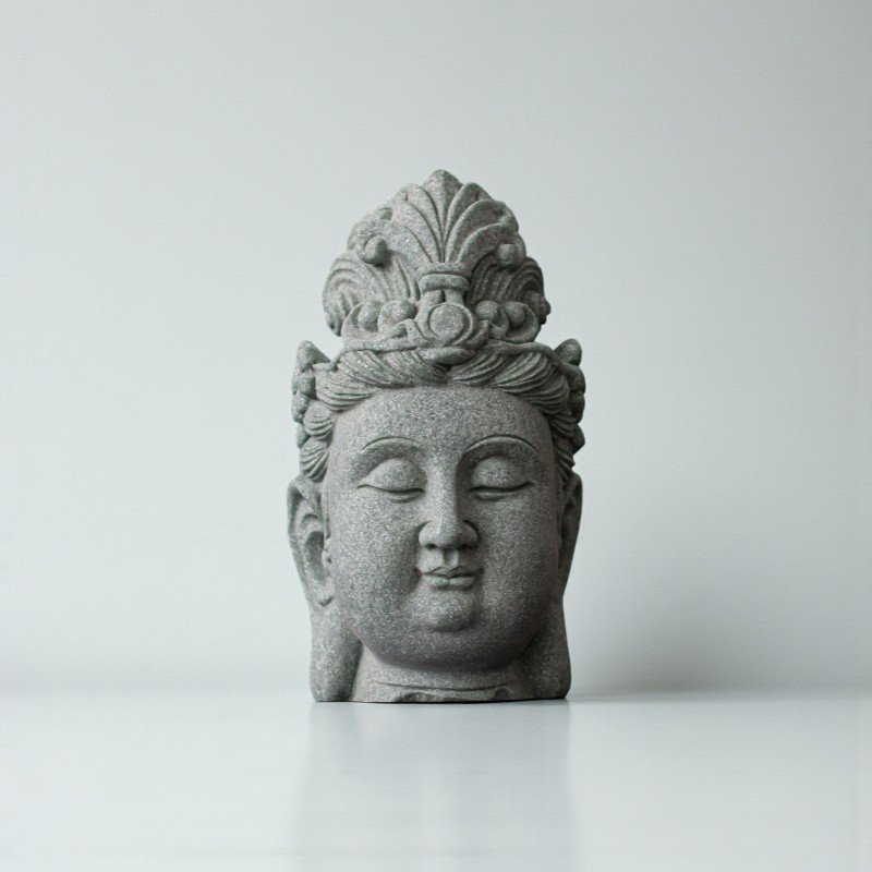 Manjushri statue head in green sandstone