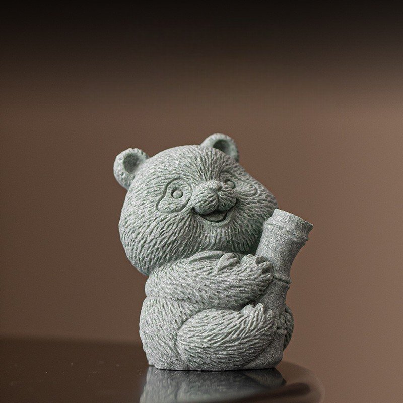 Success" (Jie Jie Gao) panda statue holding bamboo
